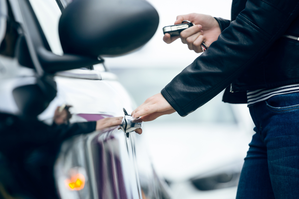 woman need automotive locksmith services to unlock car